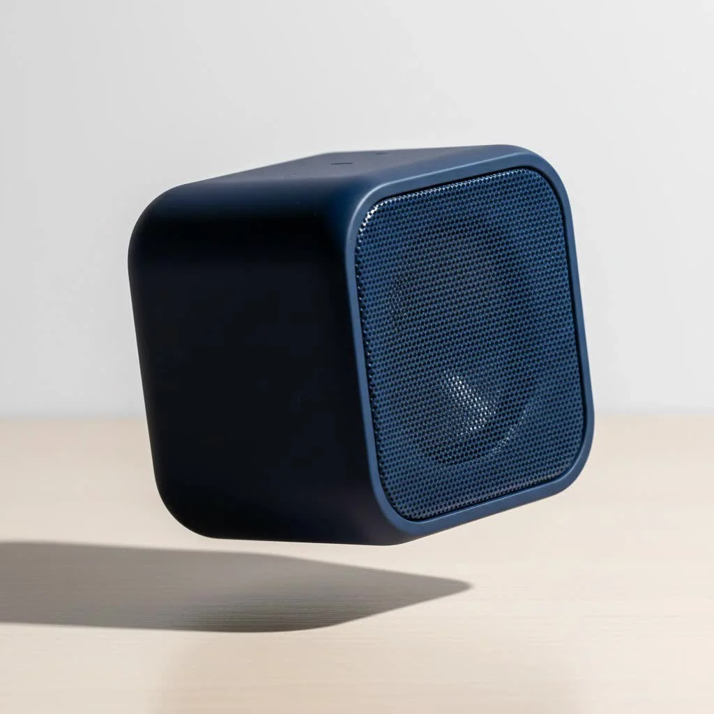 Rockville Bluetooth speaker with glowing lights at a party
